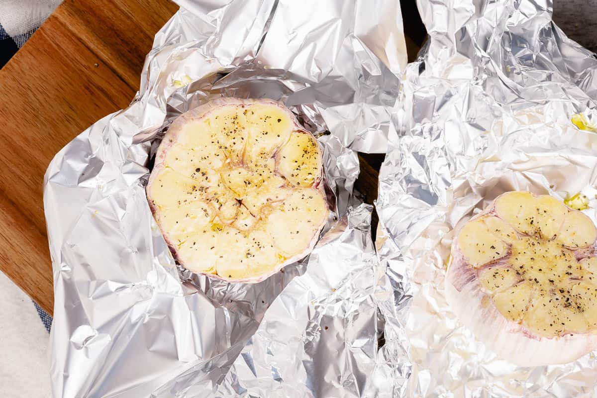 wrapping whole garlic heads in foil.