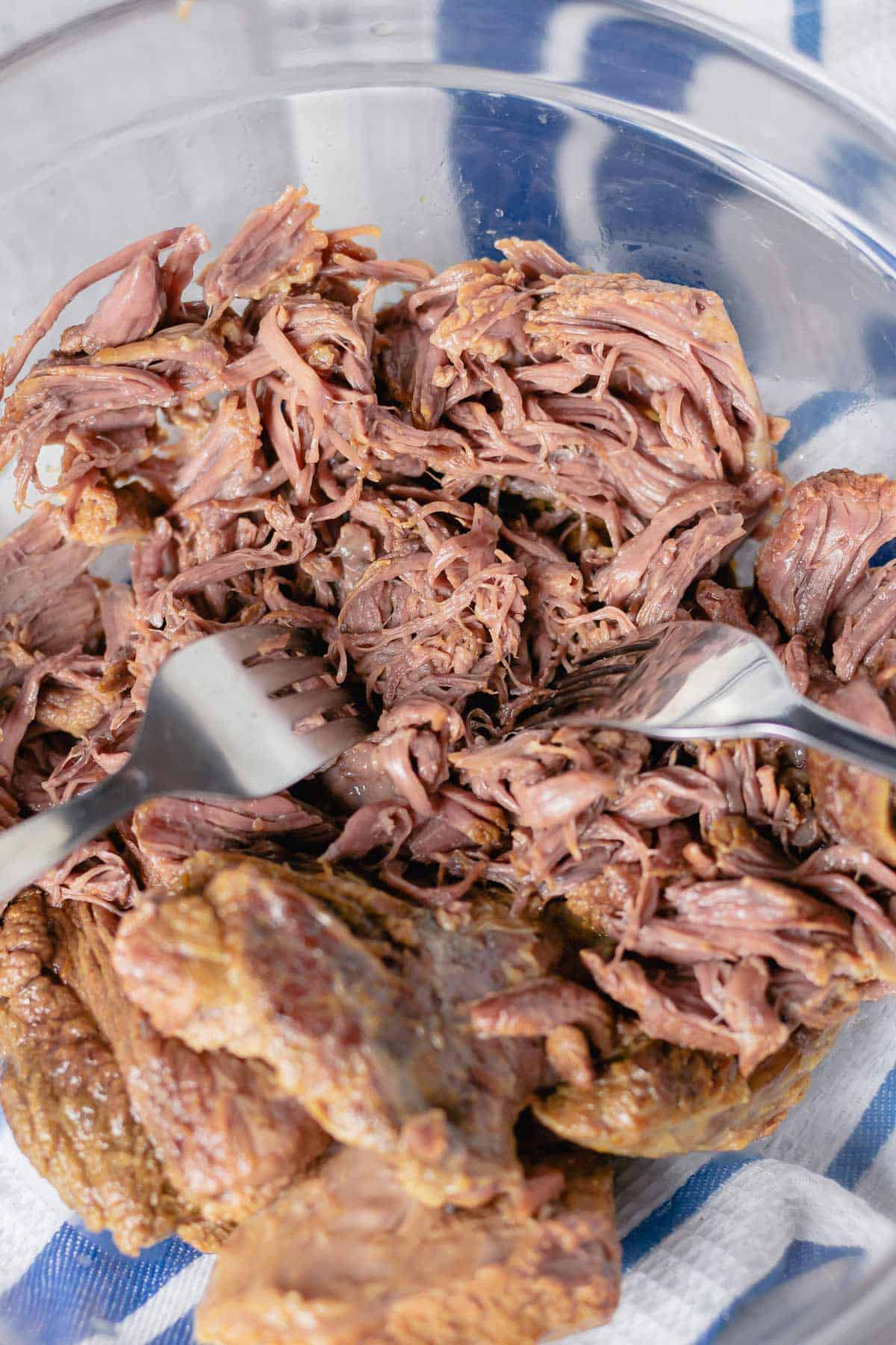 slow cooker beef pulled apart with forks