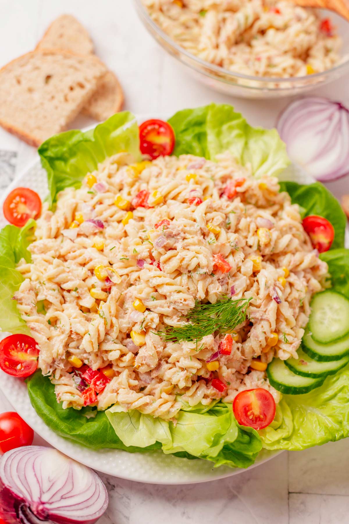 TUNA pasta salad on a bed of lettuce plate