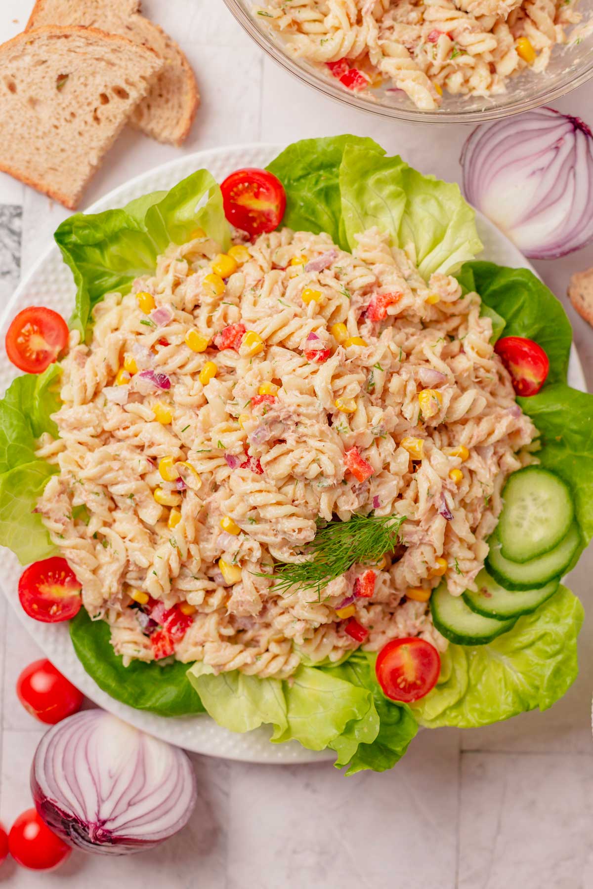 TUNA pasta salad on a bed of lettuce plate