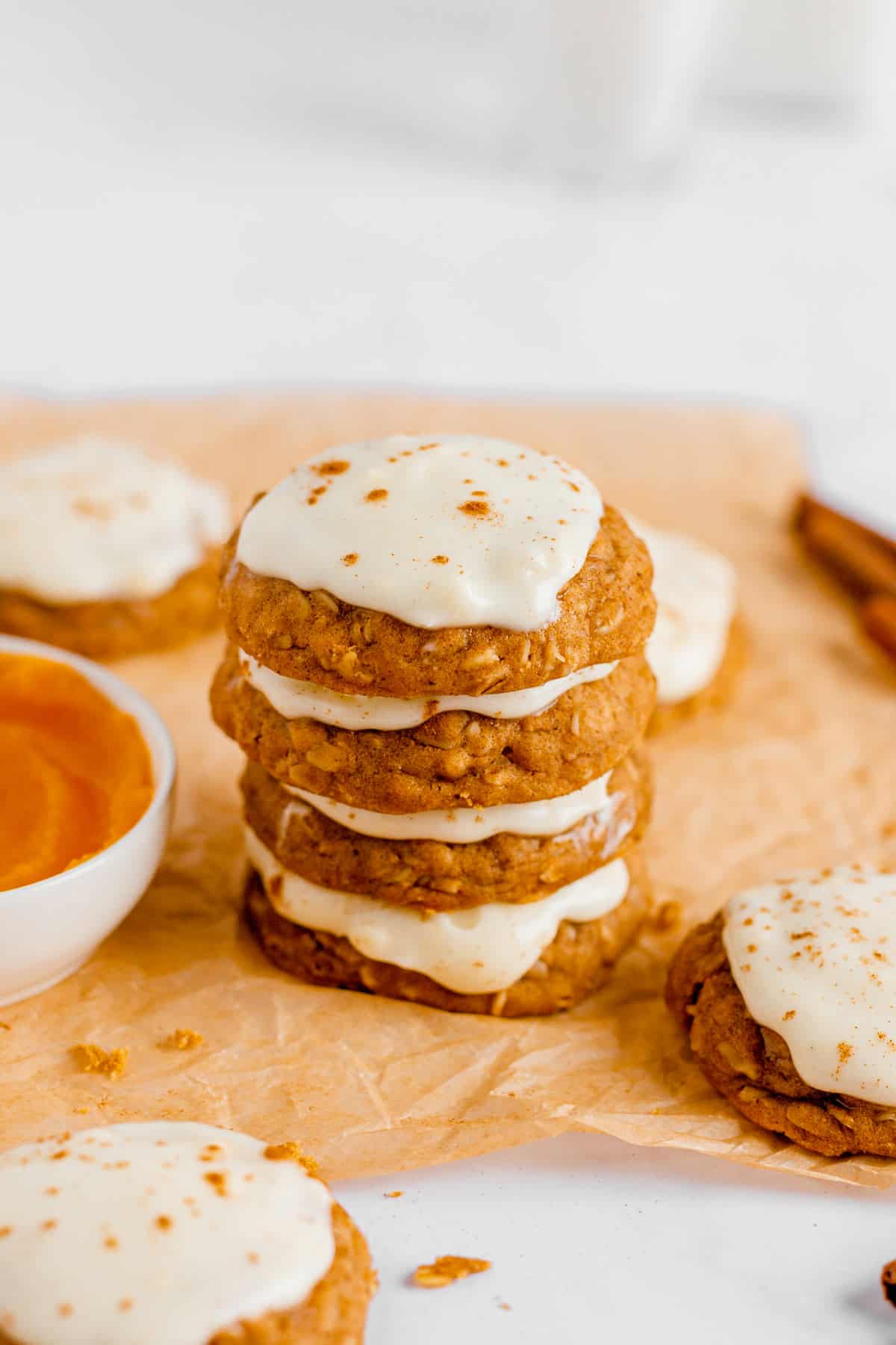 stack of Soft Pumpkin Pie Cookies With Cream Cheese Frosting