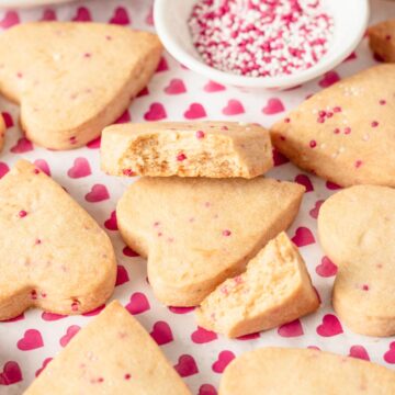 a stack of heart shaped shortbread cookies
