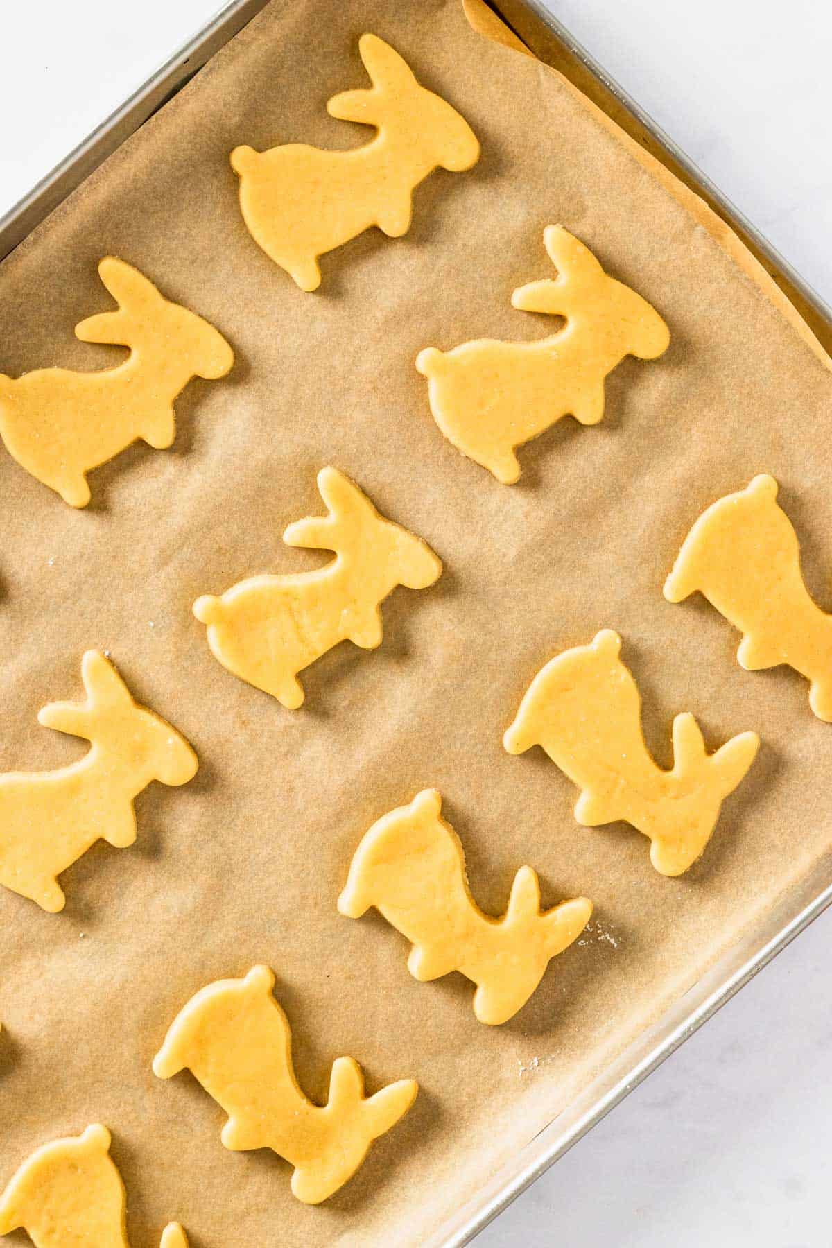 place bunny shaped cookies onto baking sheet