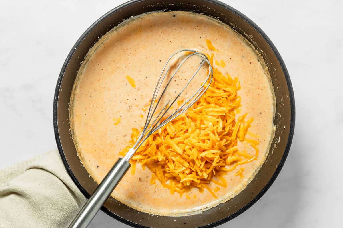 cheese added to creamy sauce
