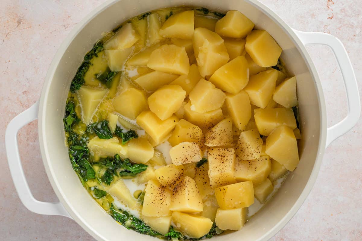 kale and potatoes in a pot