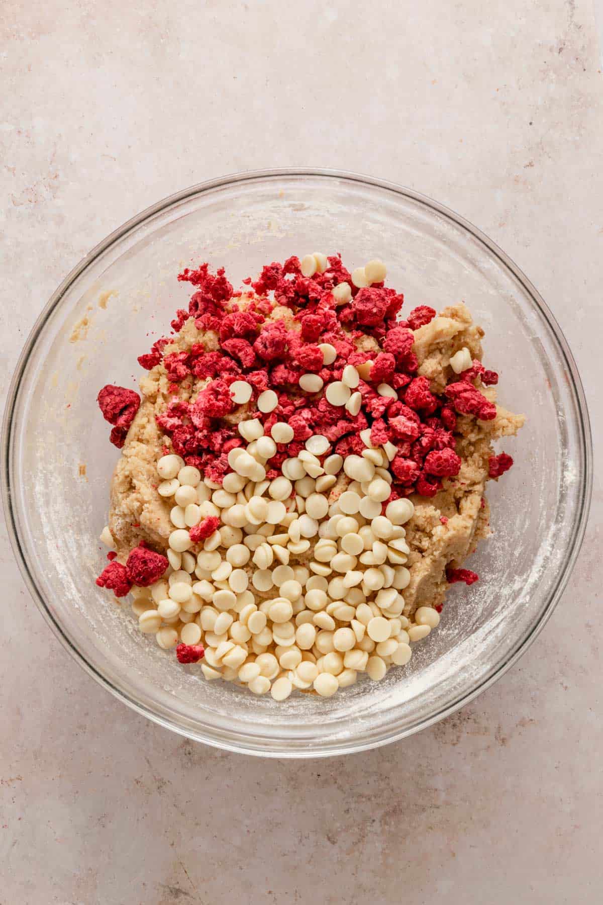 raspberries and white chocolate chips added to cookie batter