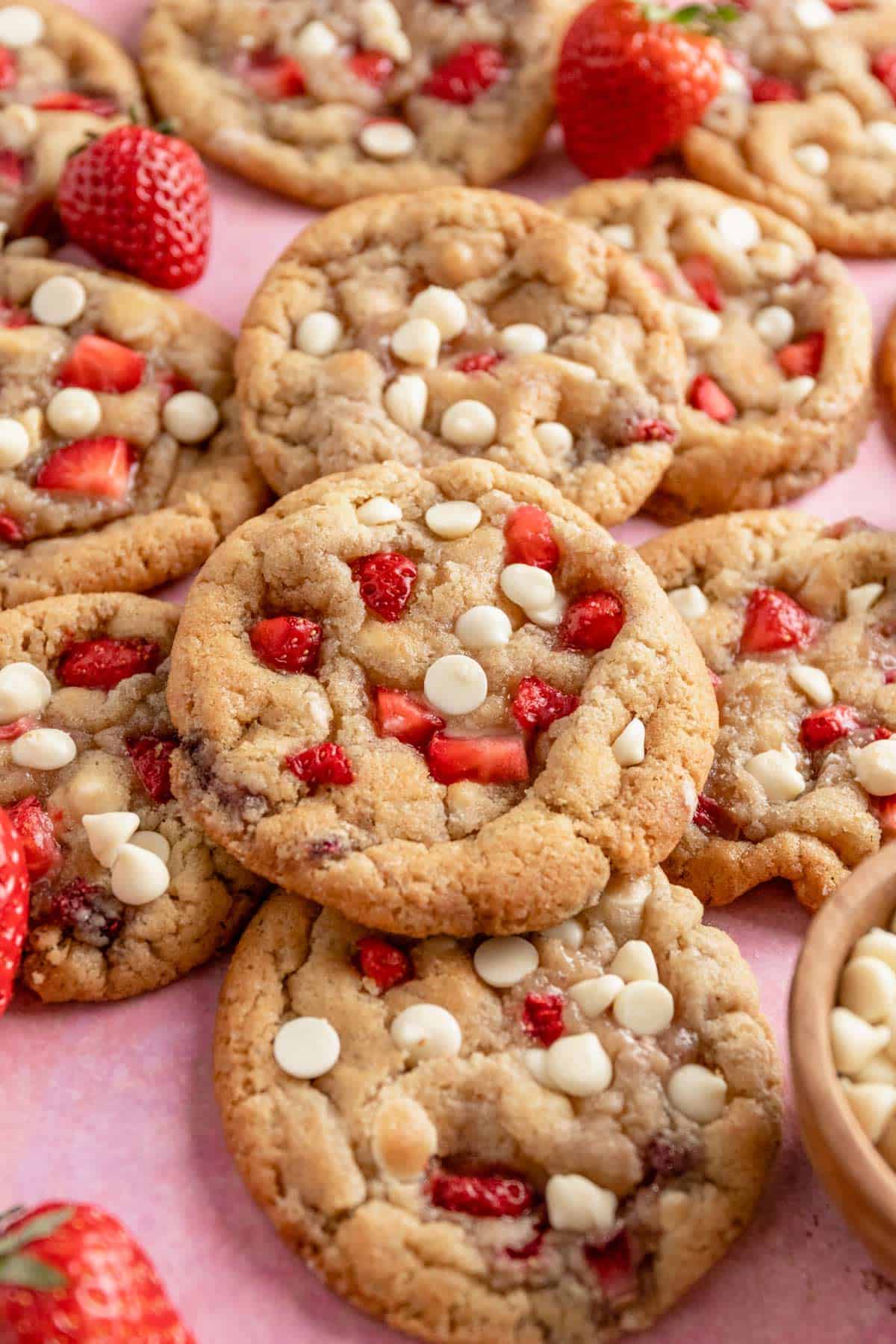 a stack of strawberry cookies with white chocolate chip cookies