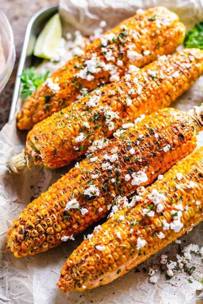 a stack of cajun corn on the cob