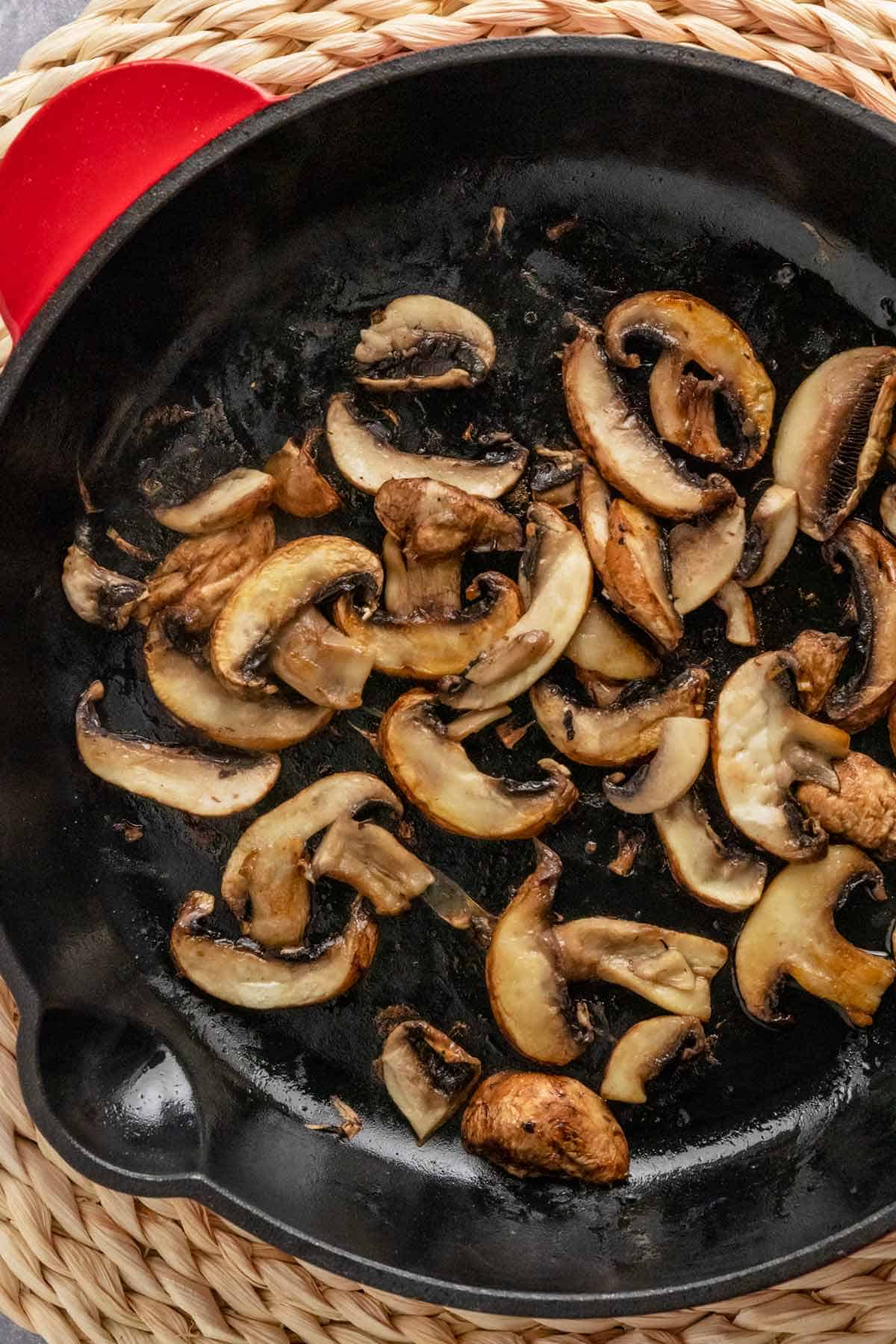sauteeing mushrooms in skillet