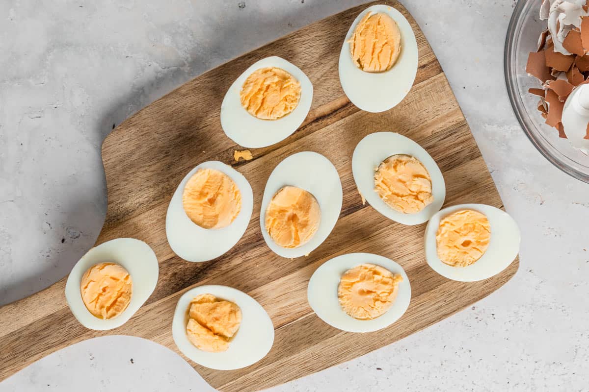 cooked egg white halves with creamy yolk filling