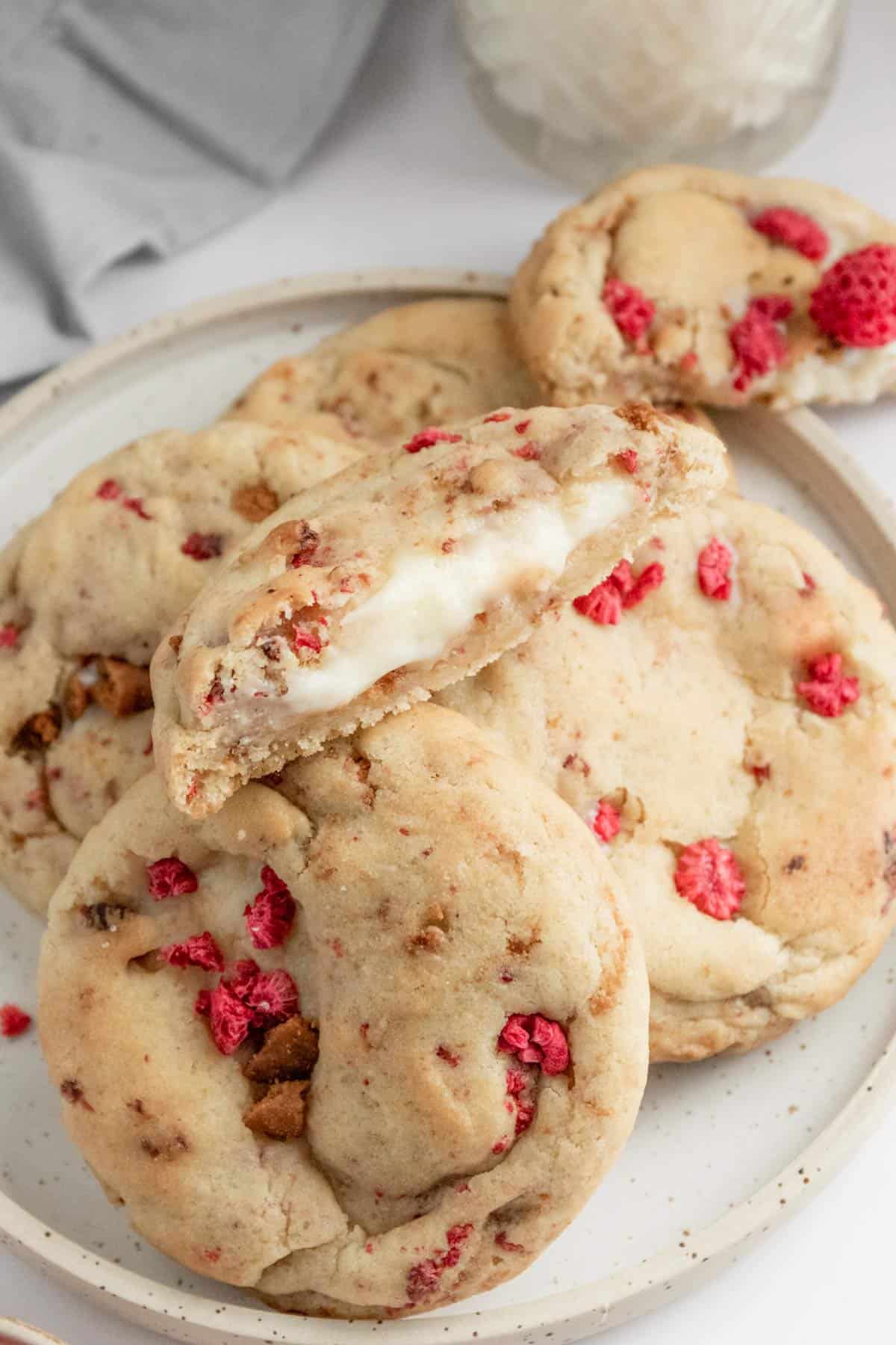 a stack of raspberry cheesecake cookies