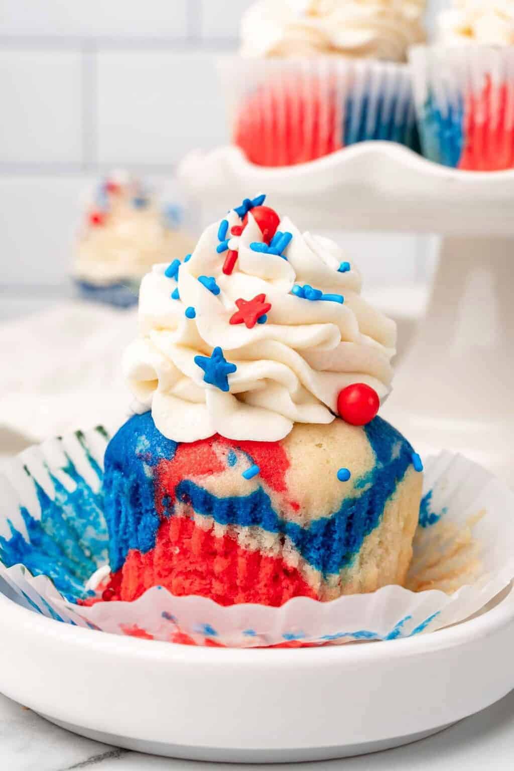 patriotic white cupcakes with red and blue.