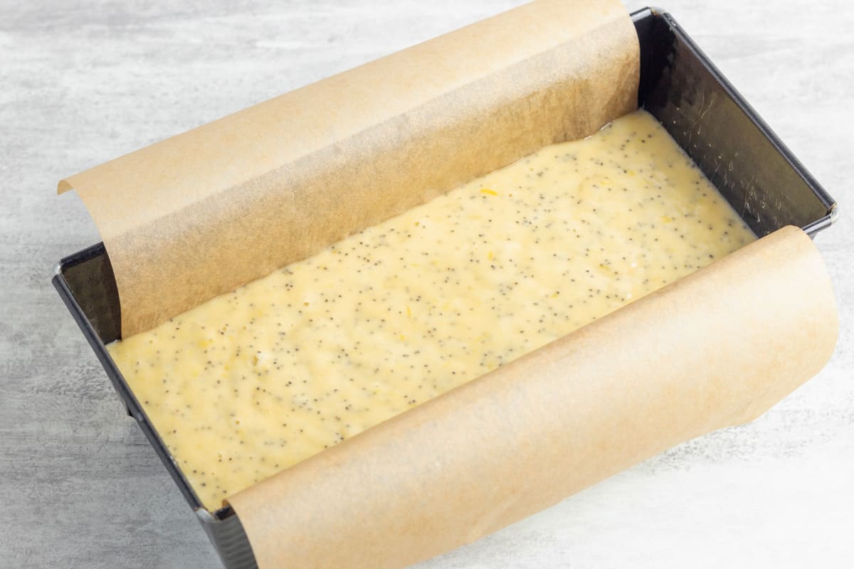 lemon poppyseed bread batter in loaf tin