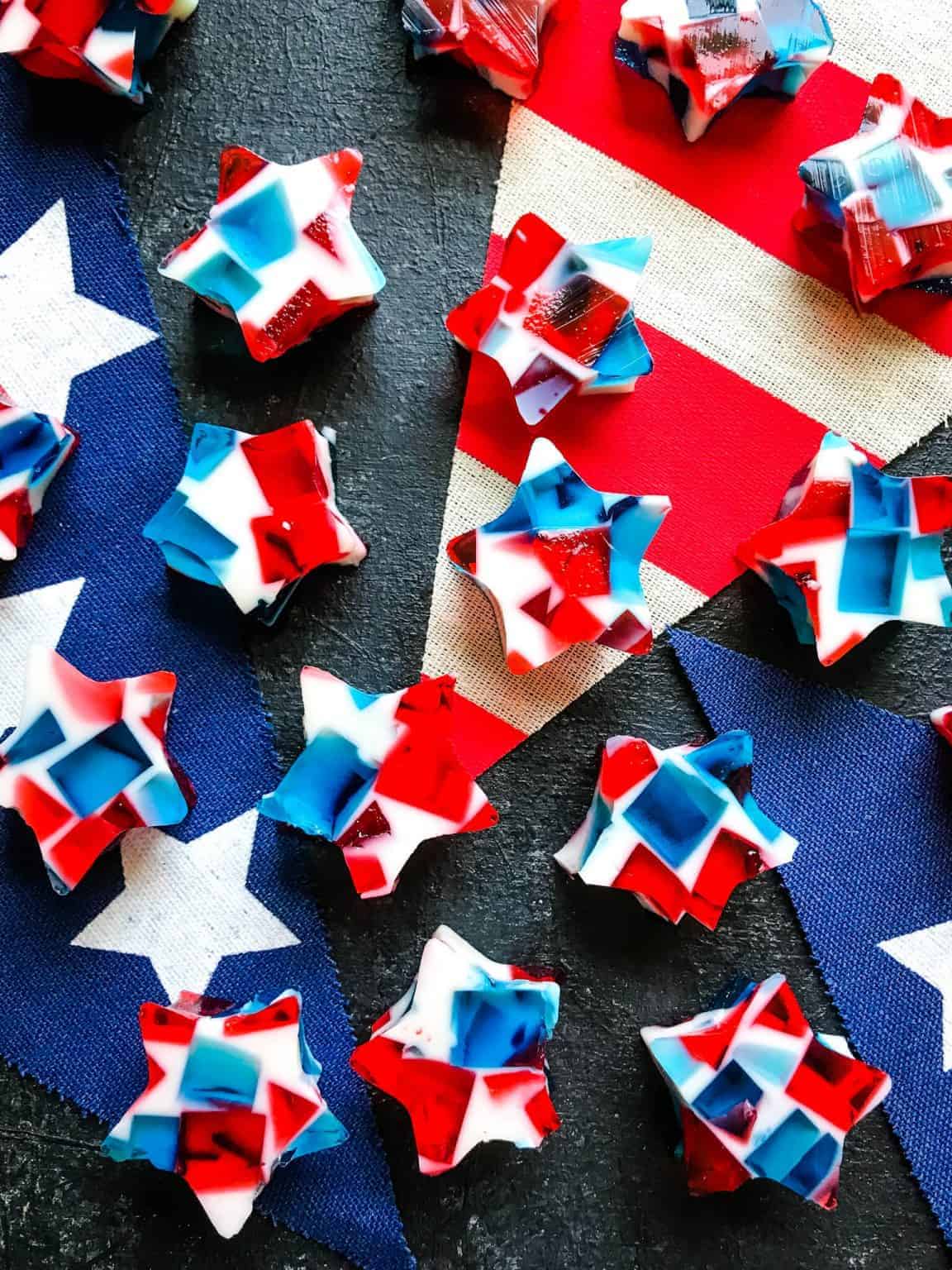 star shaped jello shots in mosaic pattern with red, white and blue colors.