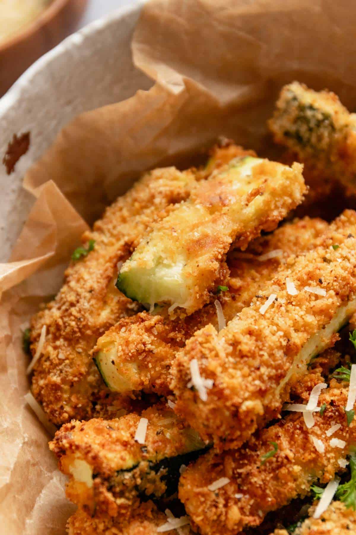 almond flour breaded zucchini fries in a bowl.