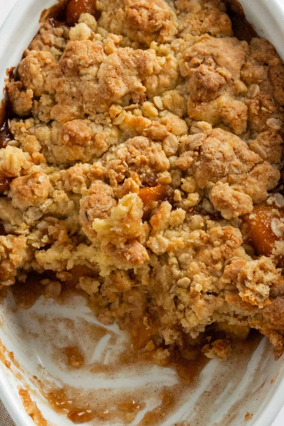 peach cobbler with golden brown topping.
