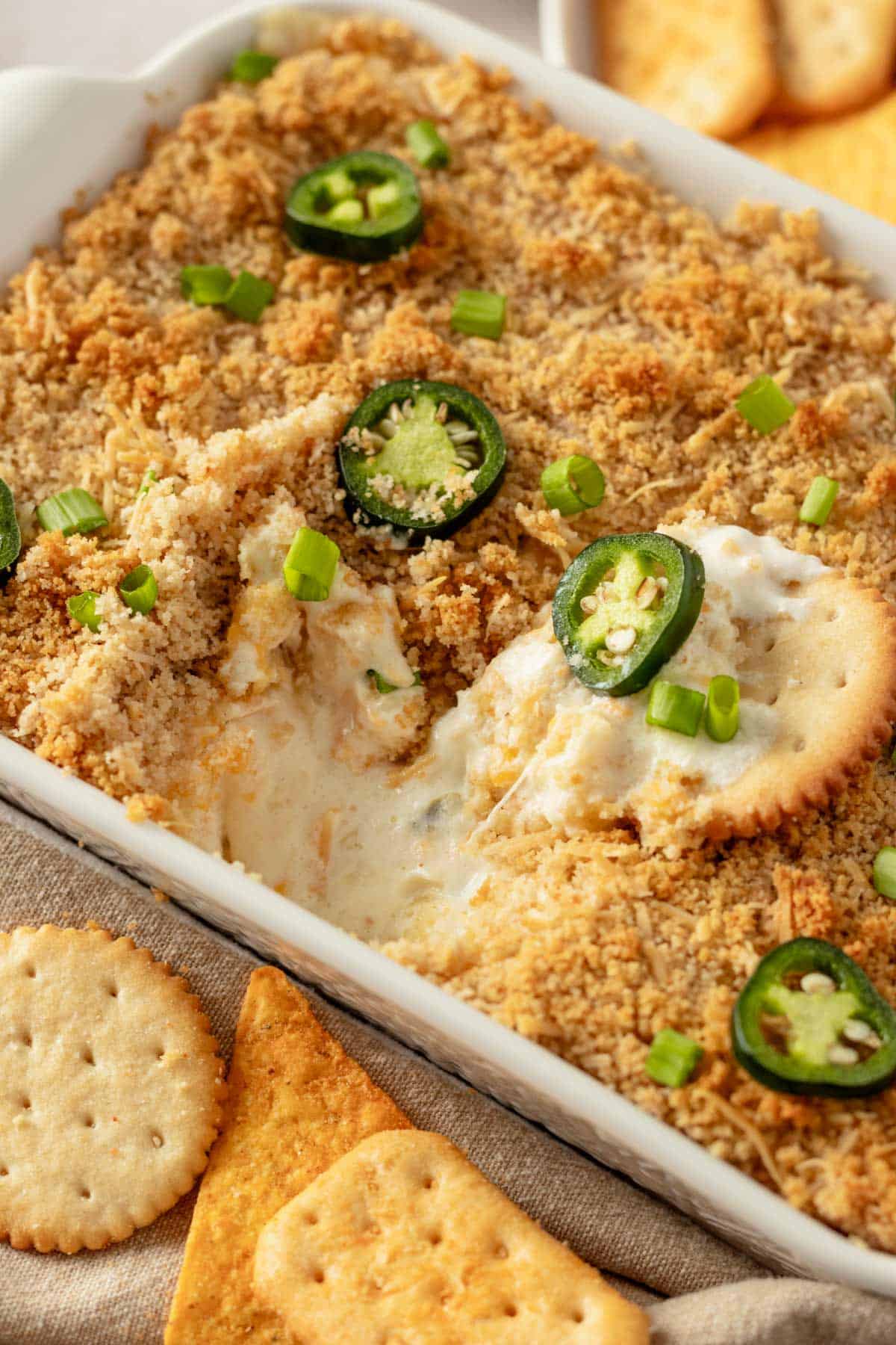 baked golden brown jalapeno dip in casserole.