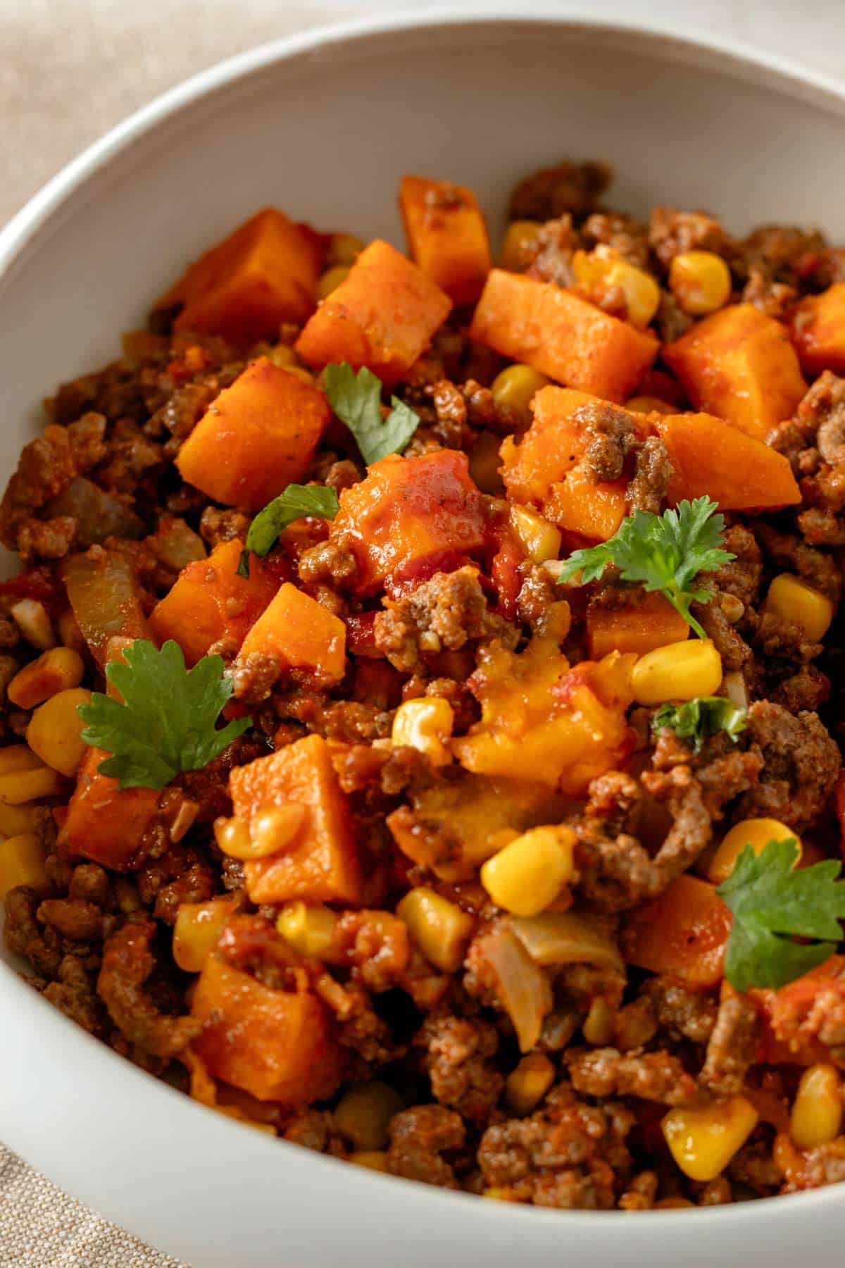 a bowl of mexican ground beef and sweet potatoes.