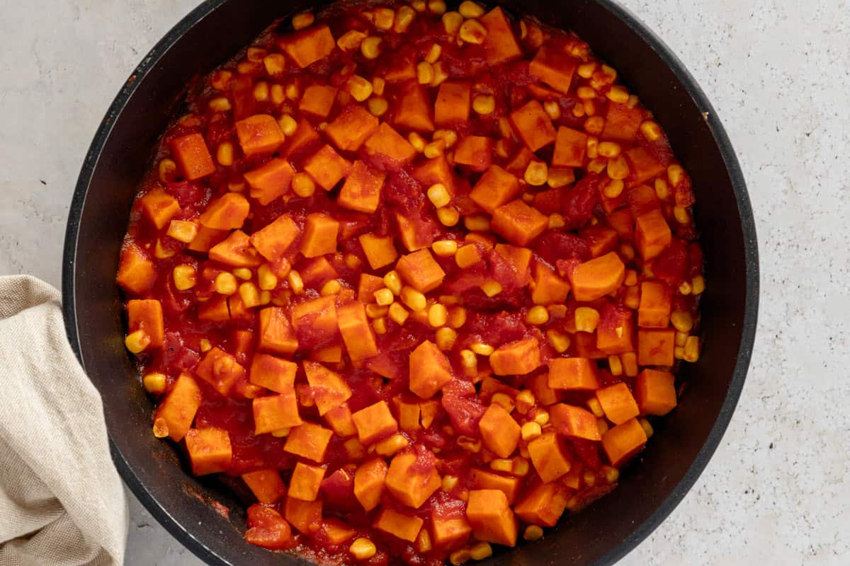 cooking sweet potatoes in skillet.