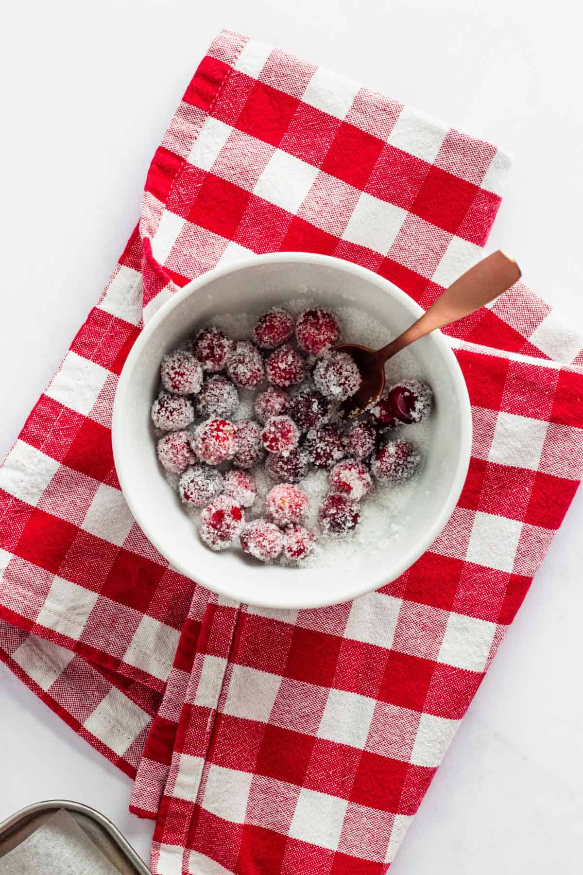 sugar coated cranberries in a bowl.