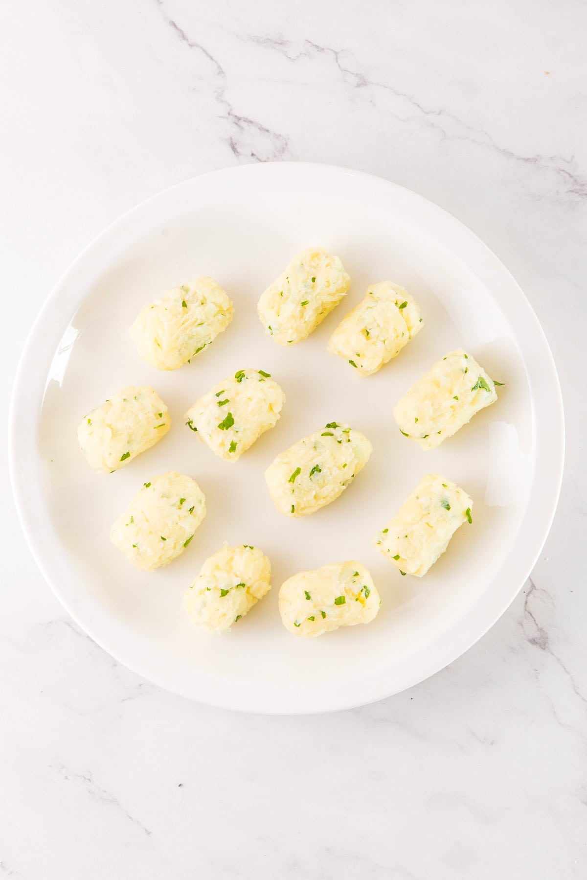 shaped potato tots before cooking.