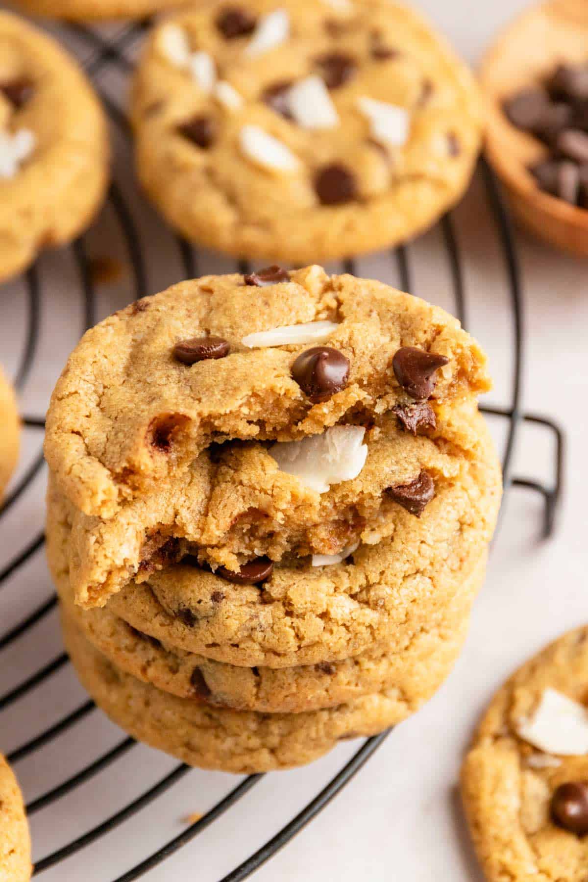 a stack of chocolate chip cookies with coconut.