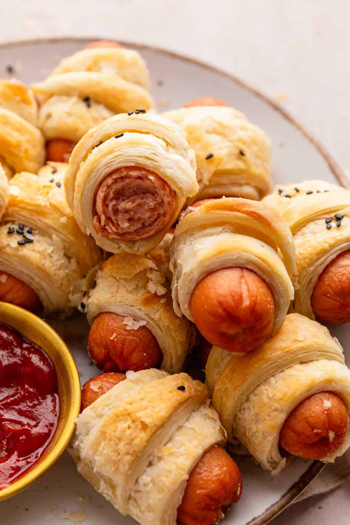 a stack of pigs in blanket.
