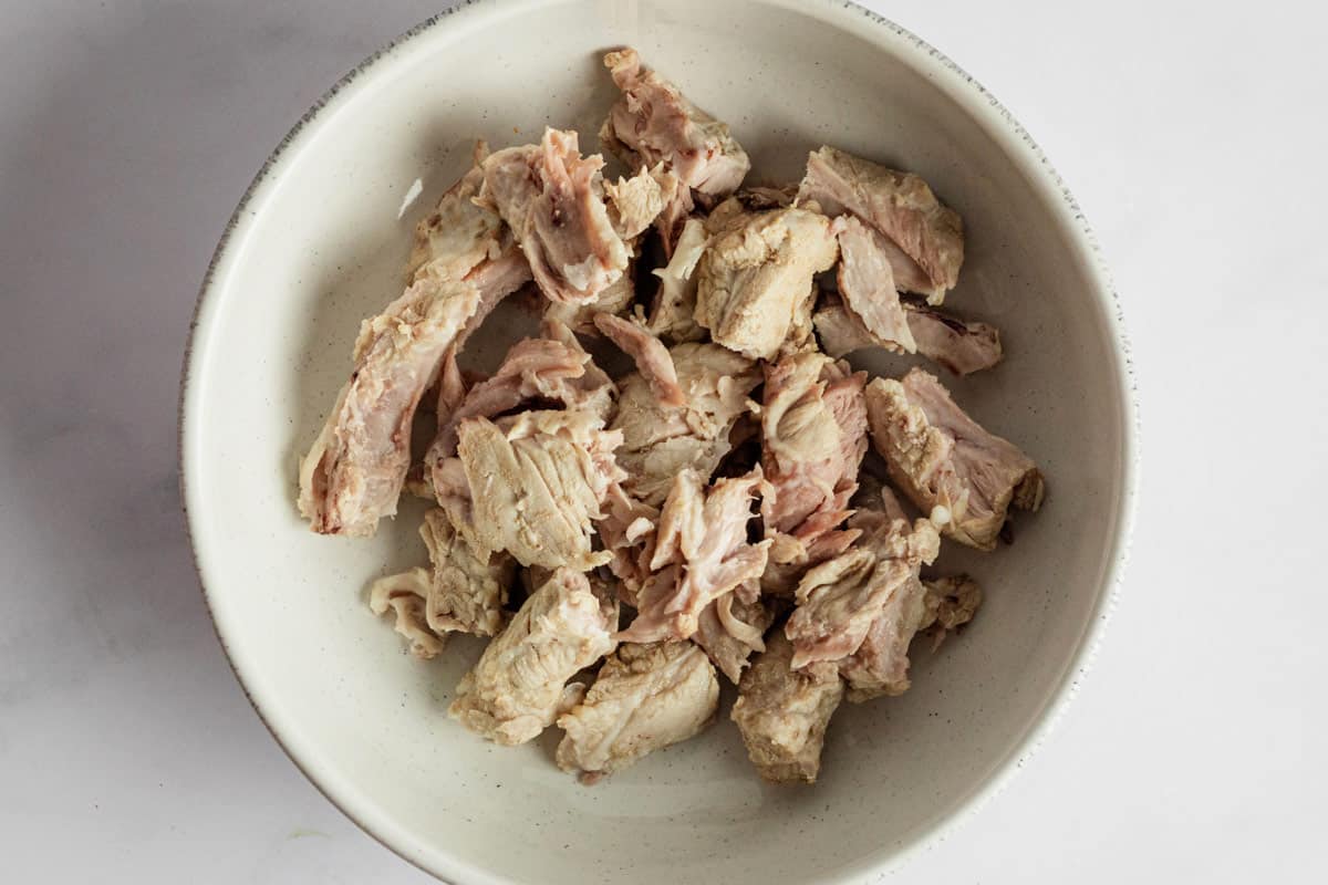 cooked pork in a bowl.