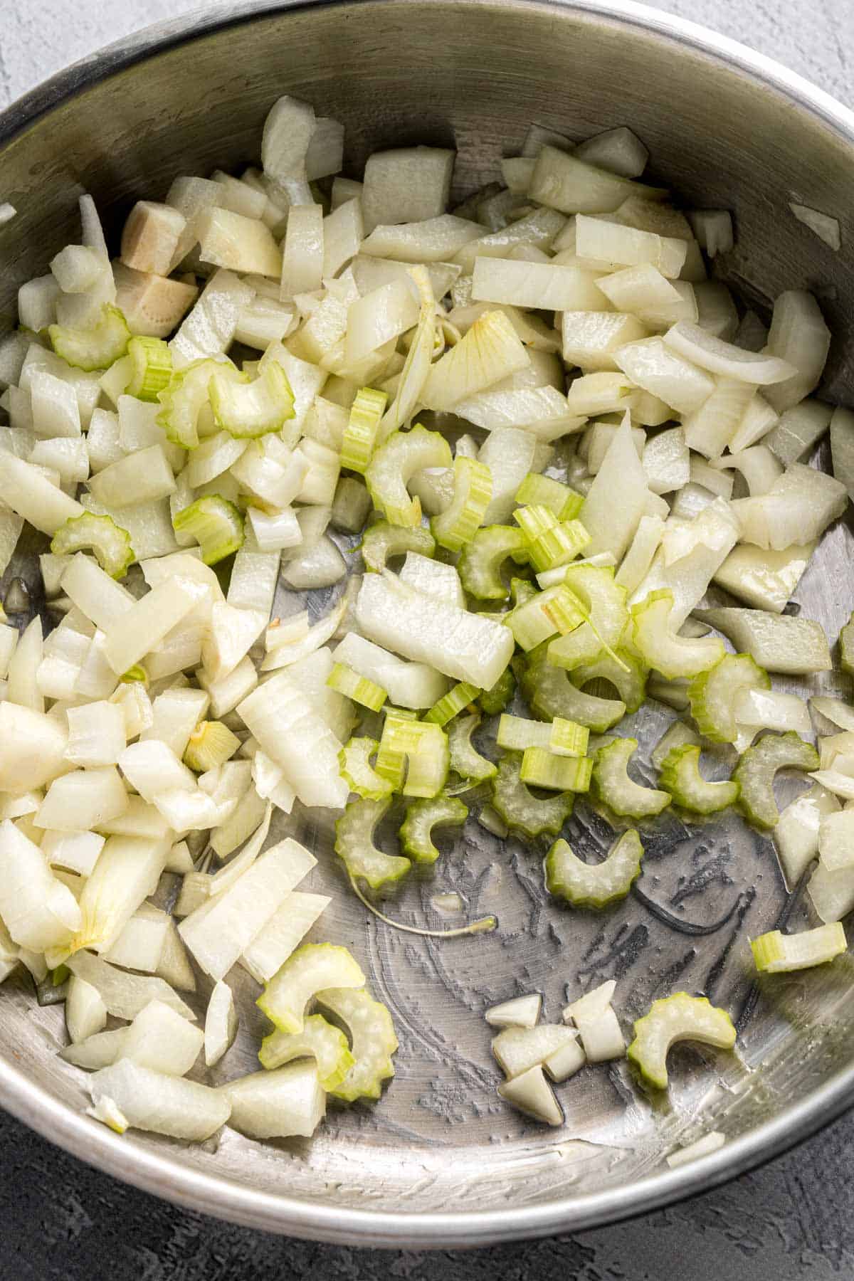 sauteeing onion in skillet.