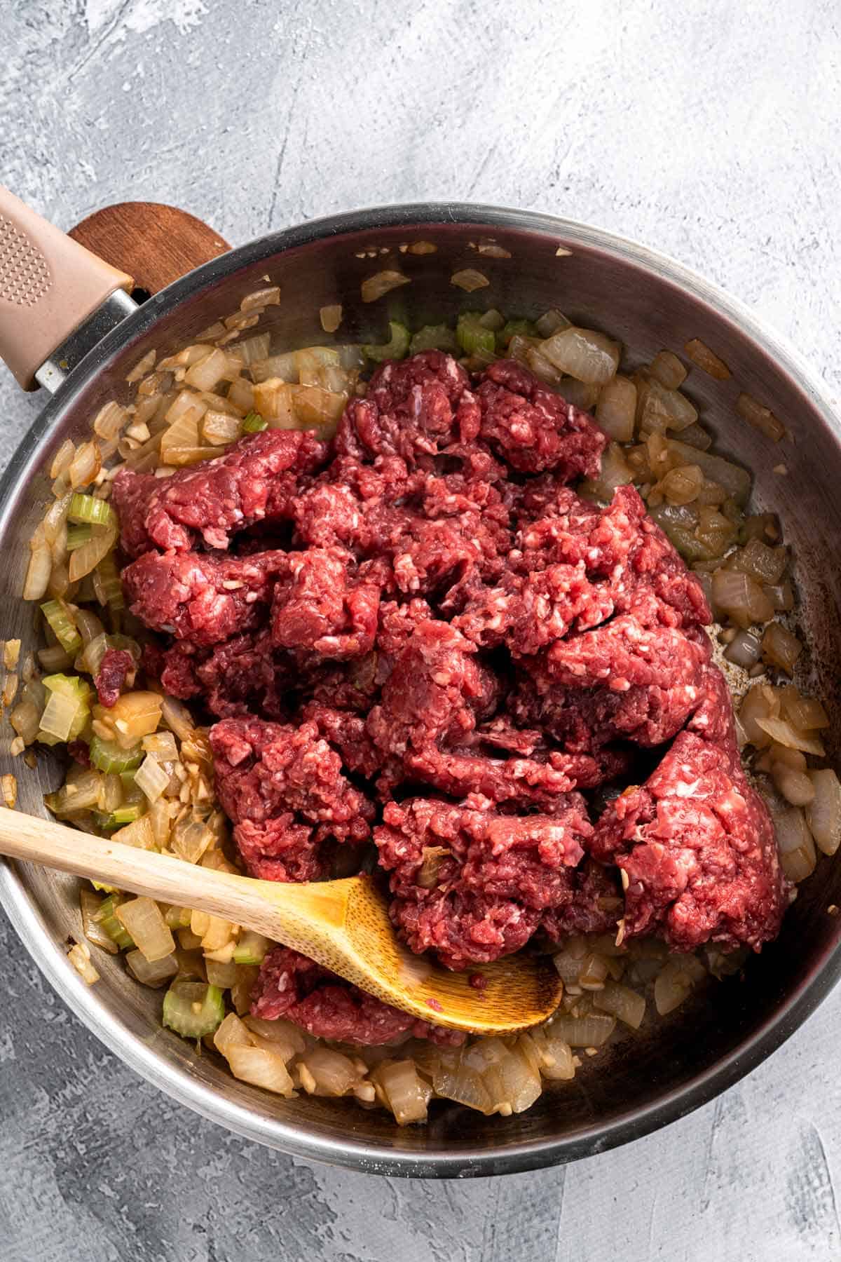 cooking ground beef in skillet.