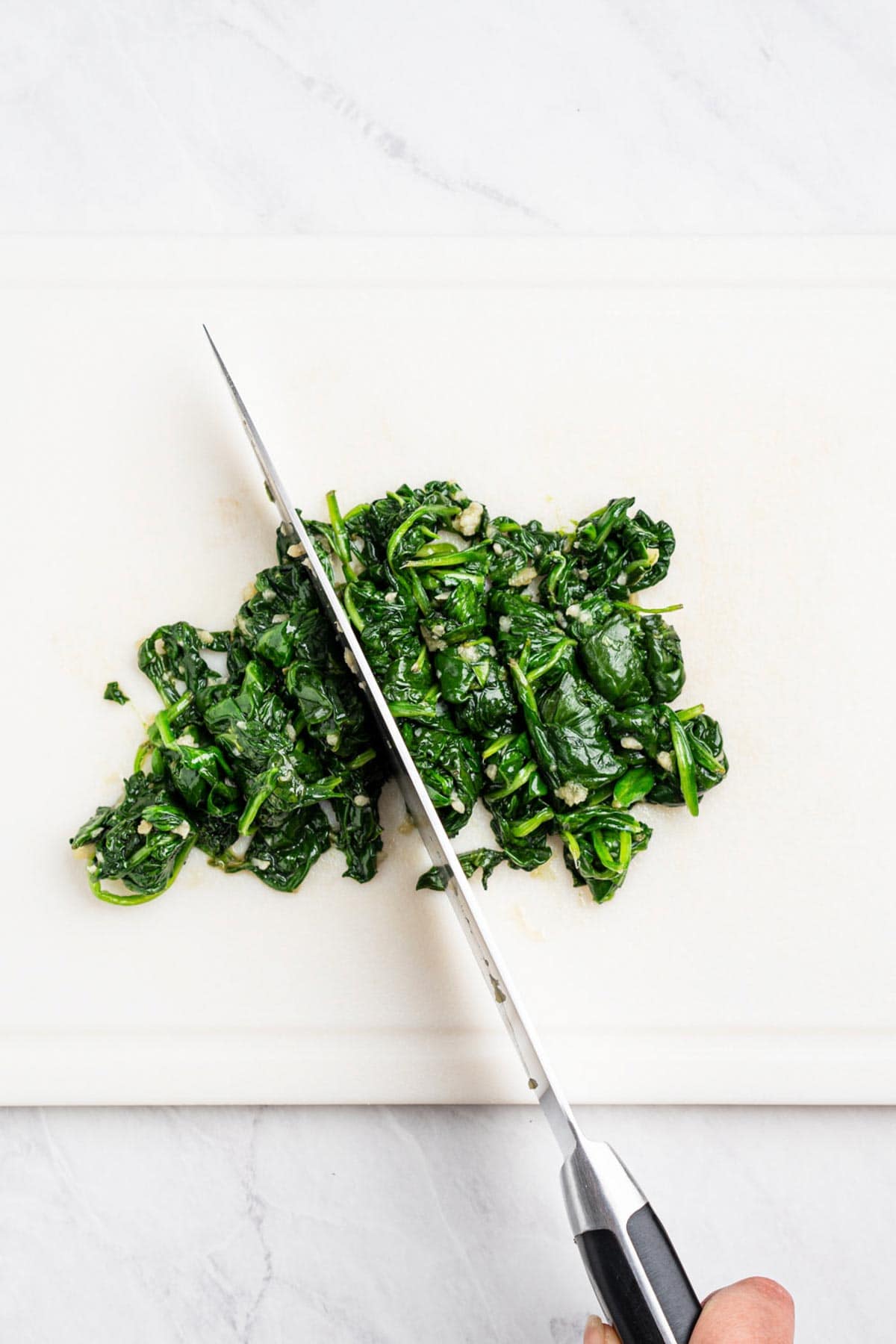 cutting spinach.