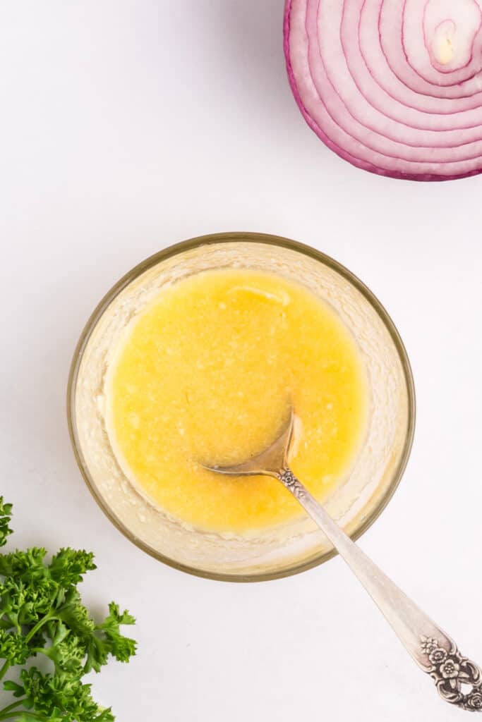 yellow butter mixture in a bowl.