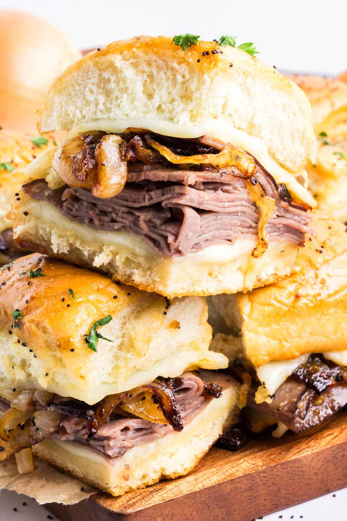 a stack of roast beef slider.