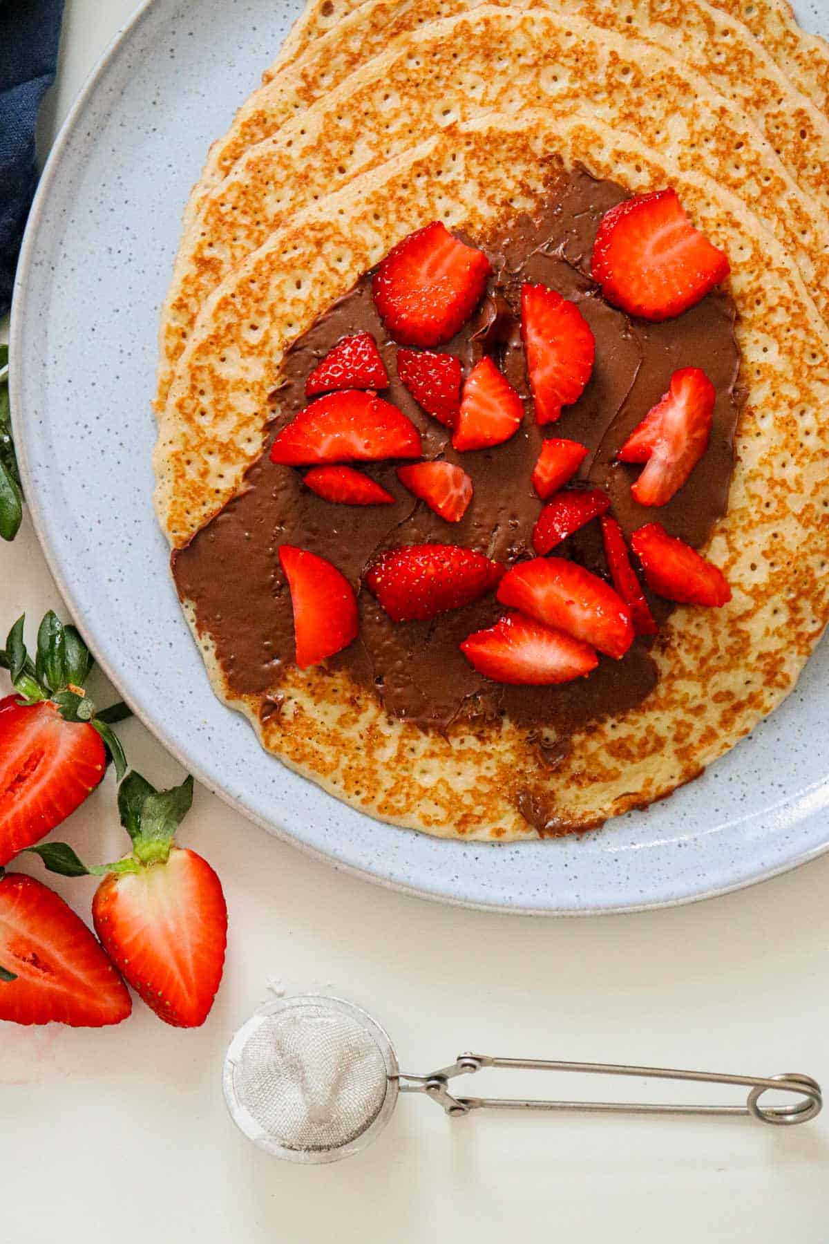 thin crepes with strawberry nutella filling.