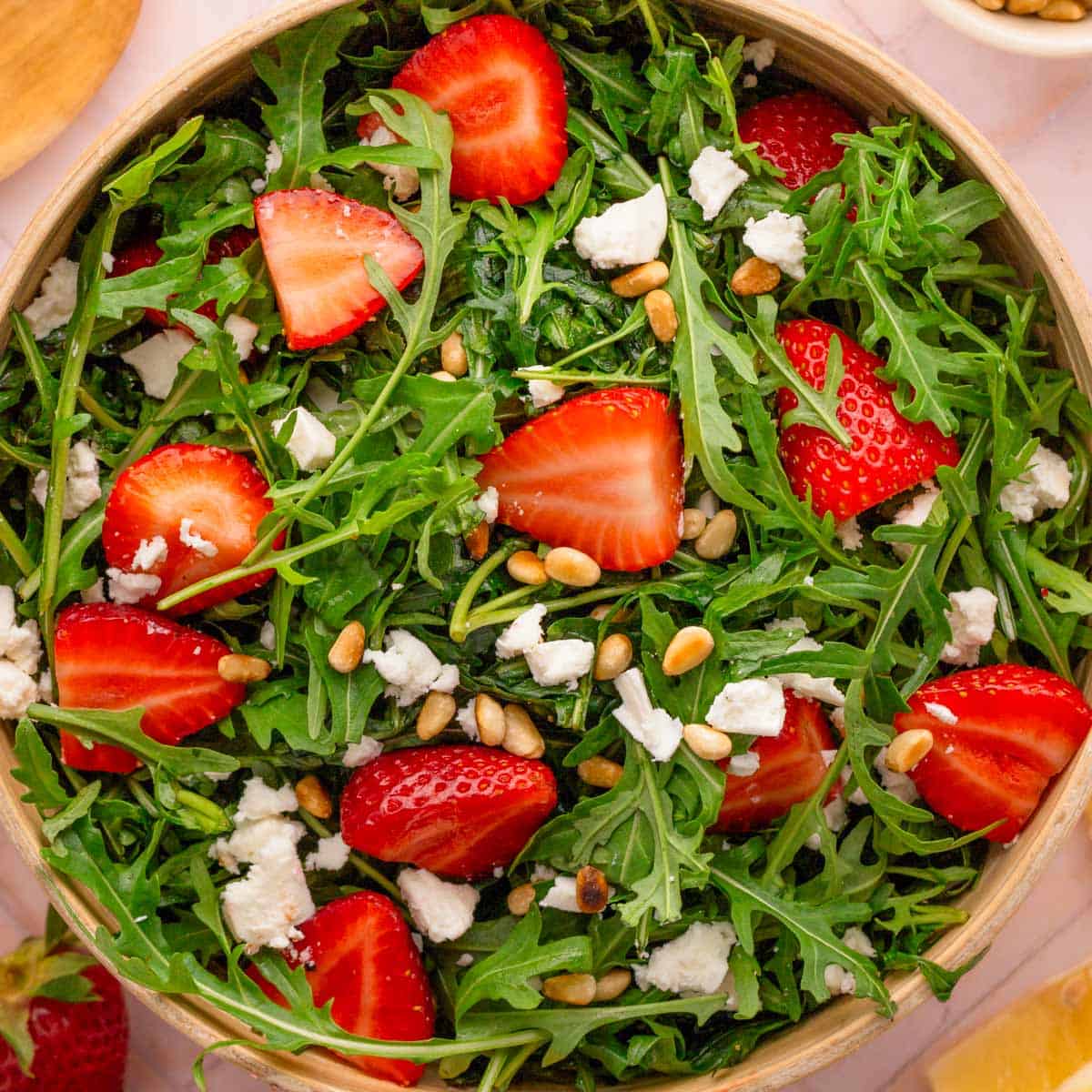 strawberry arugula salad with feta cheese.