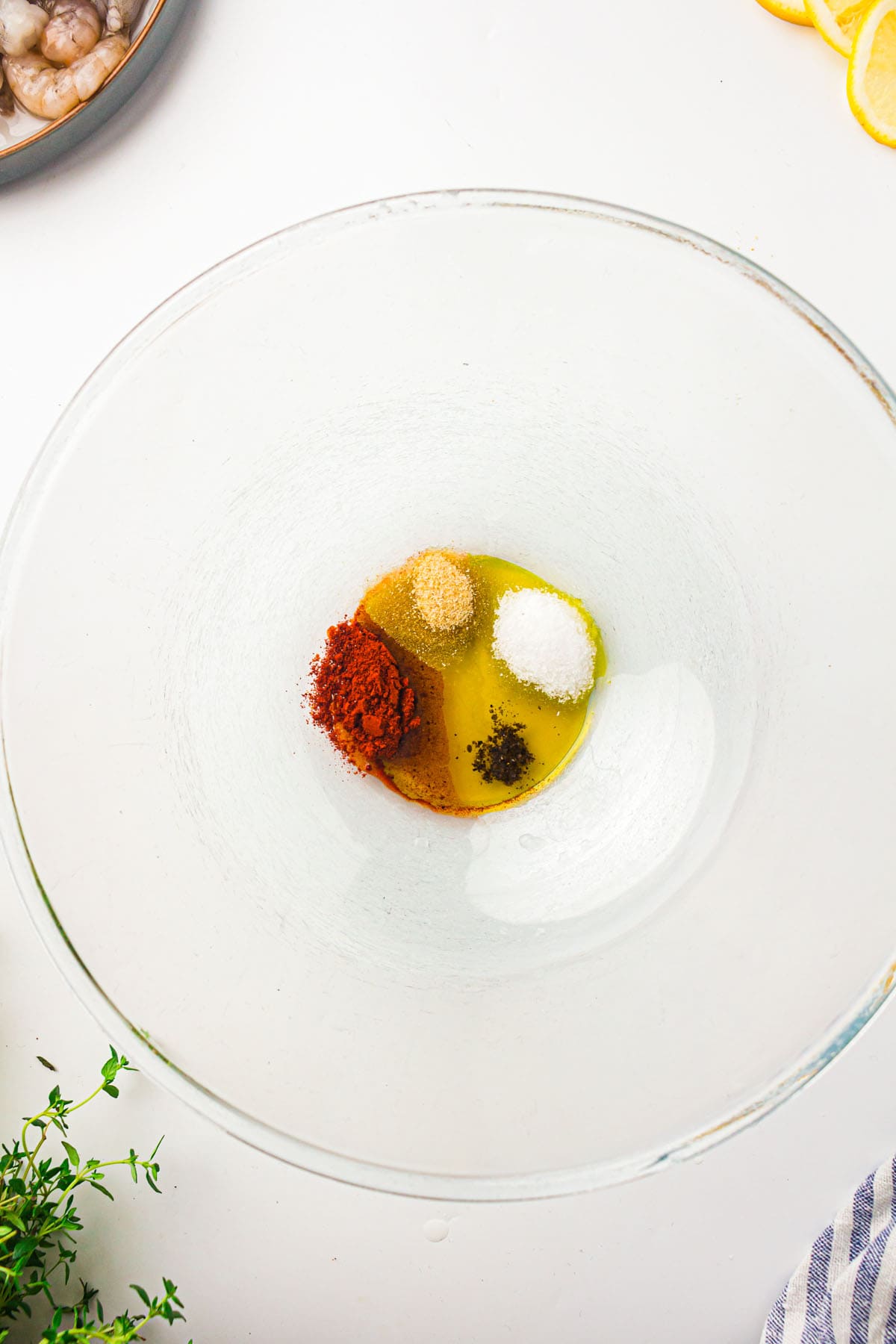 oil with seasonings in a bowl.