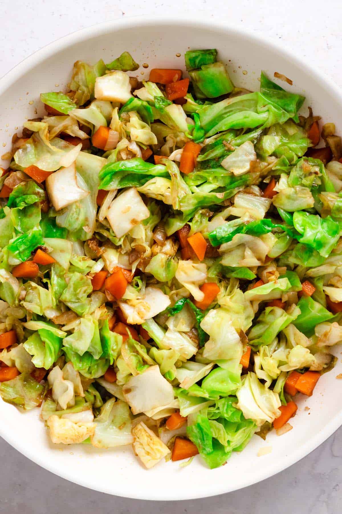 Sauteed veggies and freshly chopped cabbage.