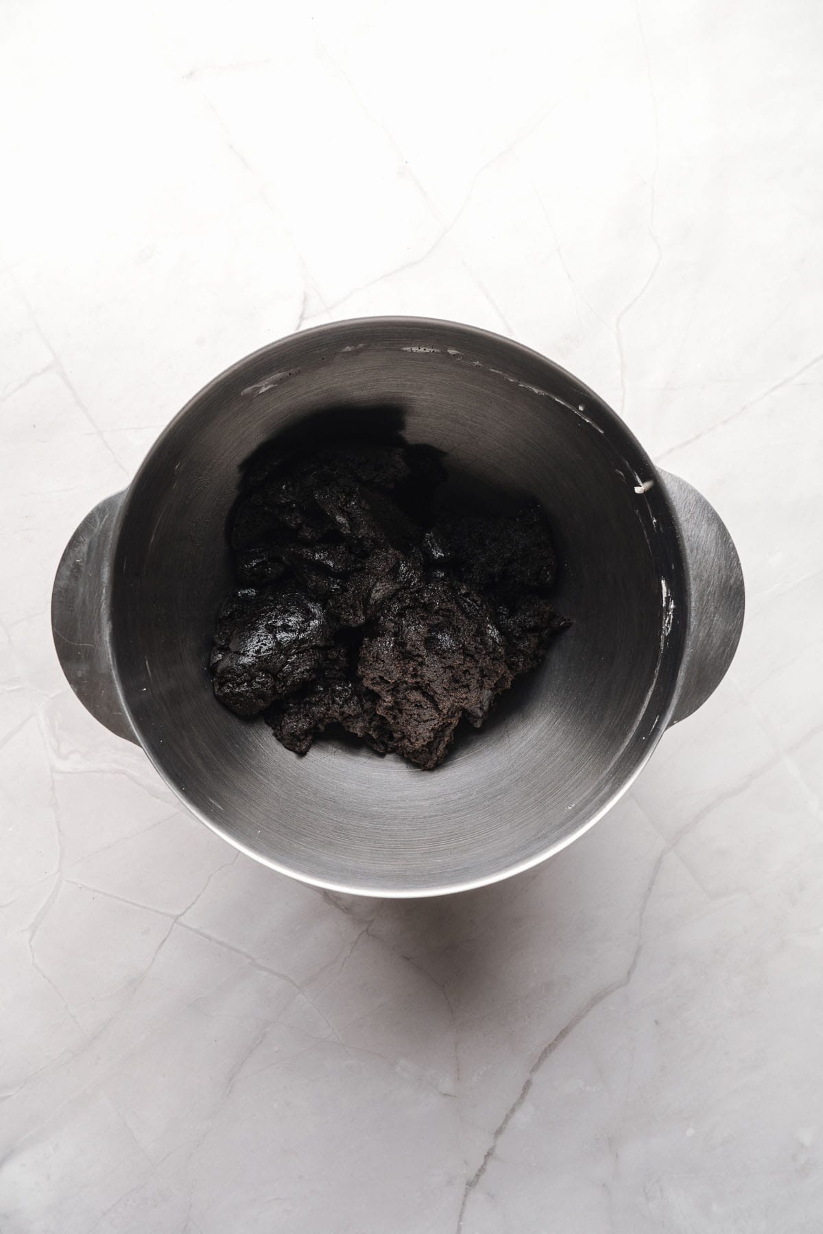 Oreo and cream cheese mixture blended in a bowl.