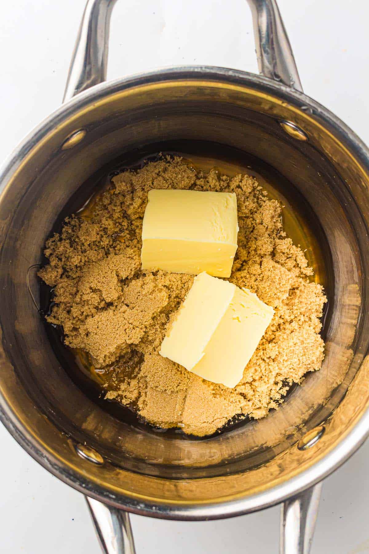 Brown sugar and butter in a saucepan.