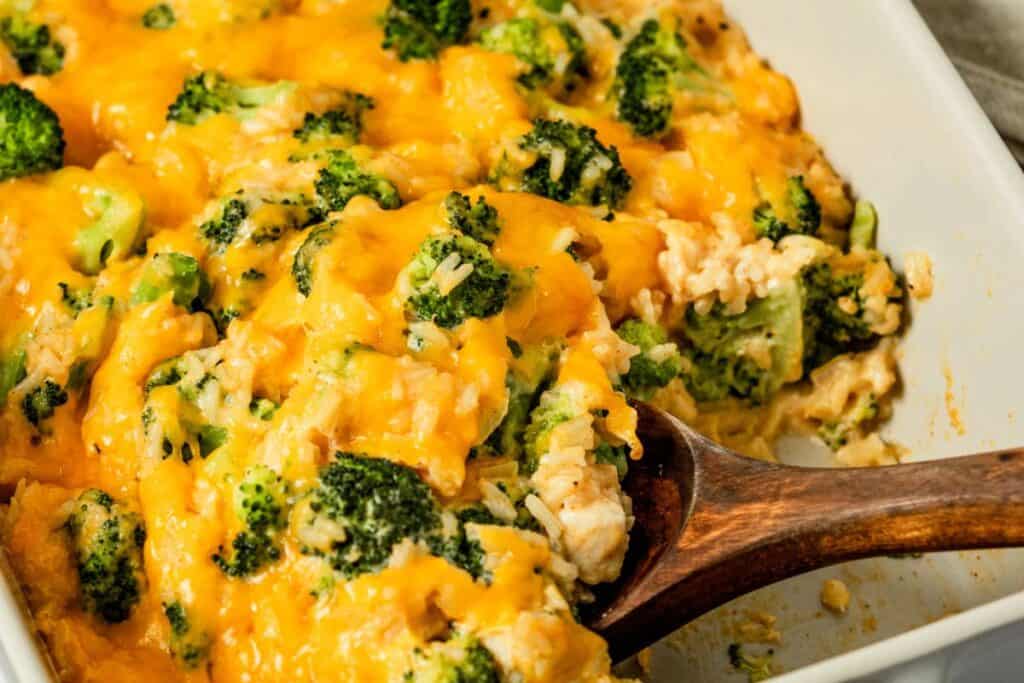 Cheesy chicken rice casserole with broccoli florets