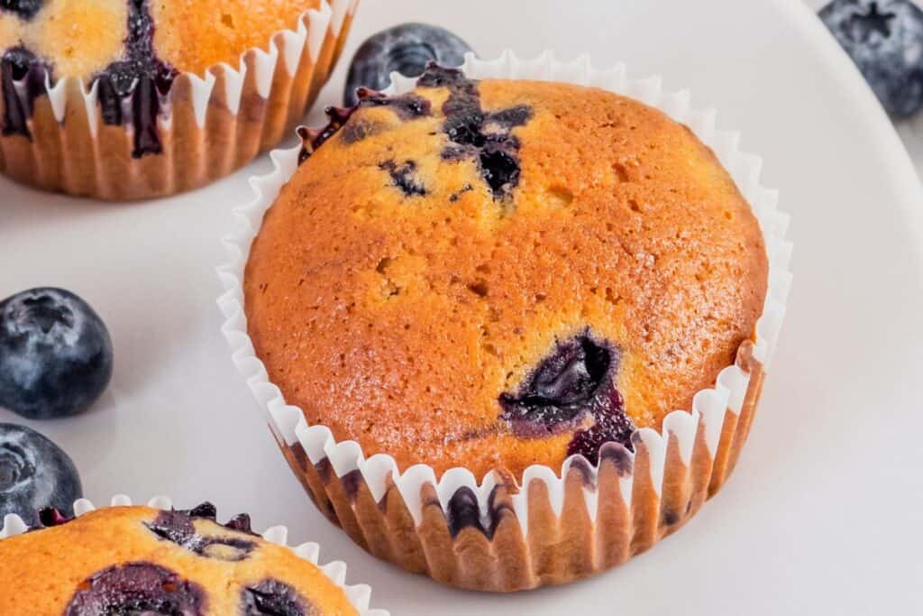 Blueberry muffins with visible berries inside