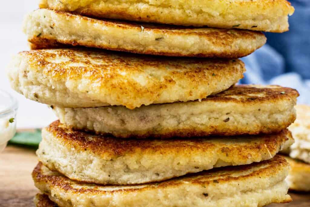 Stack of crispy Russian potato pancakes on a plate