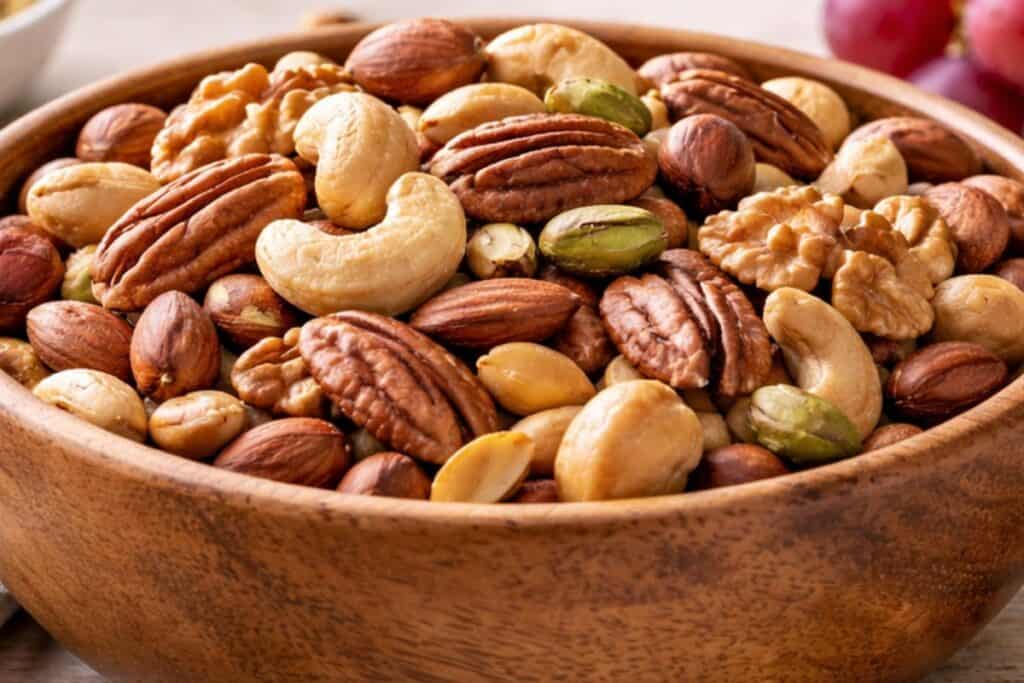 Bowl of trail mix with nuts and dried fruit