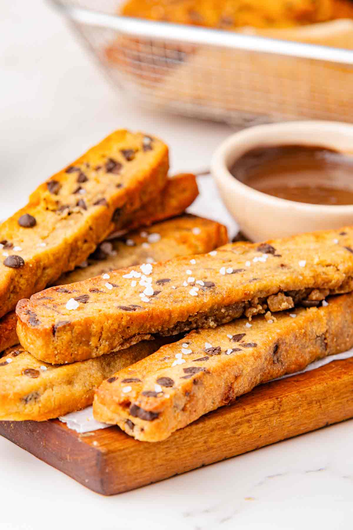 Close-up of chocolate chip cookie fries sprinkled with flaky sea salt