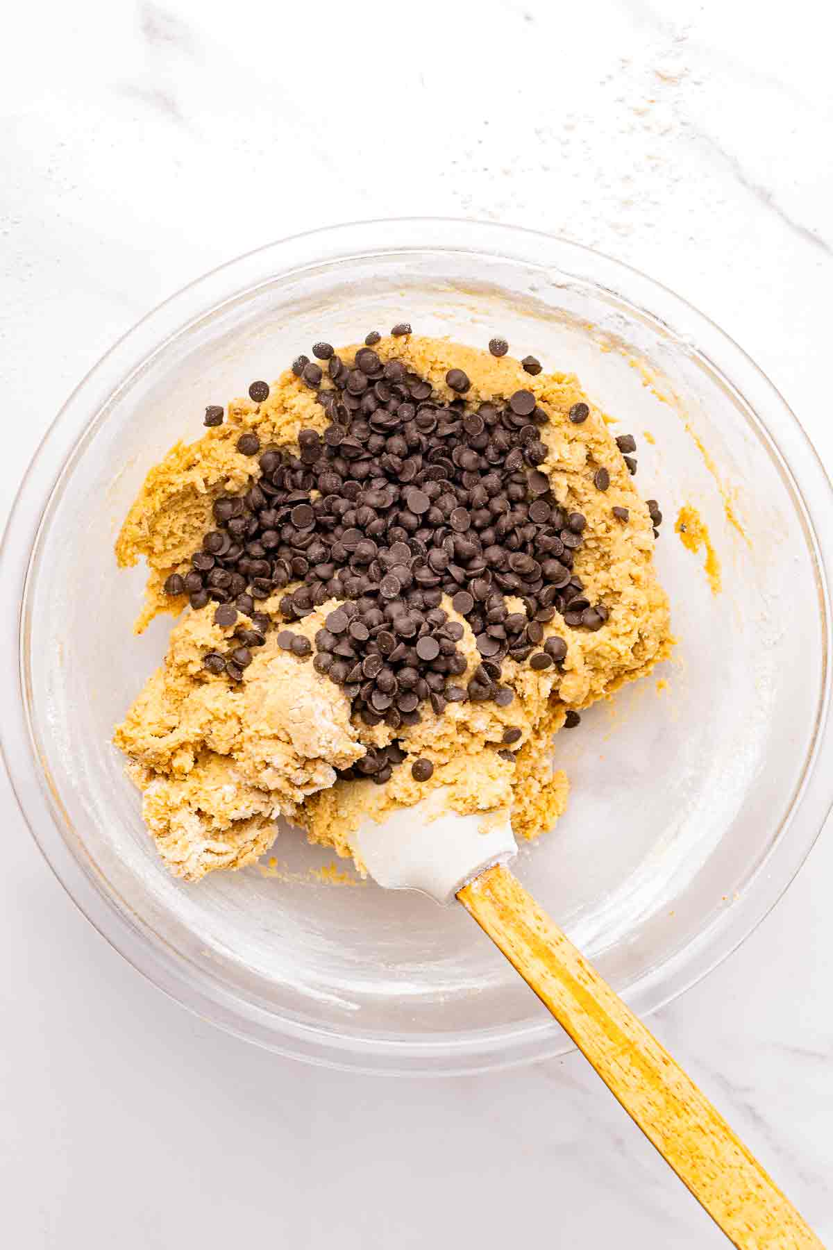 Mini chocolate chips folded into chocolate chip cookie dough