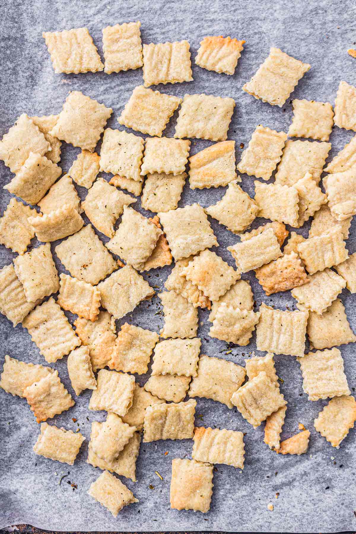 Bowl of crispy herb sourdough discard crackers