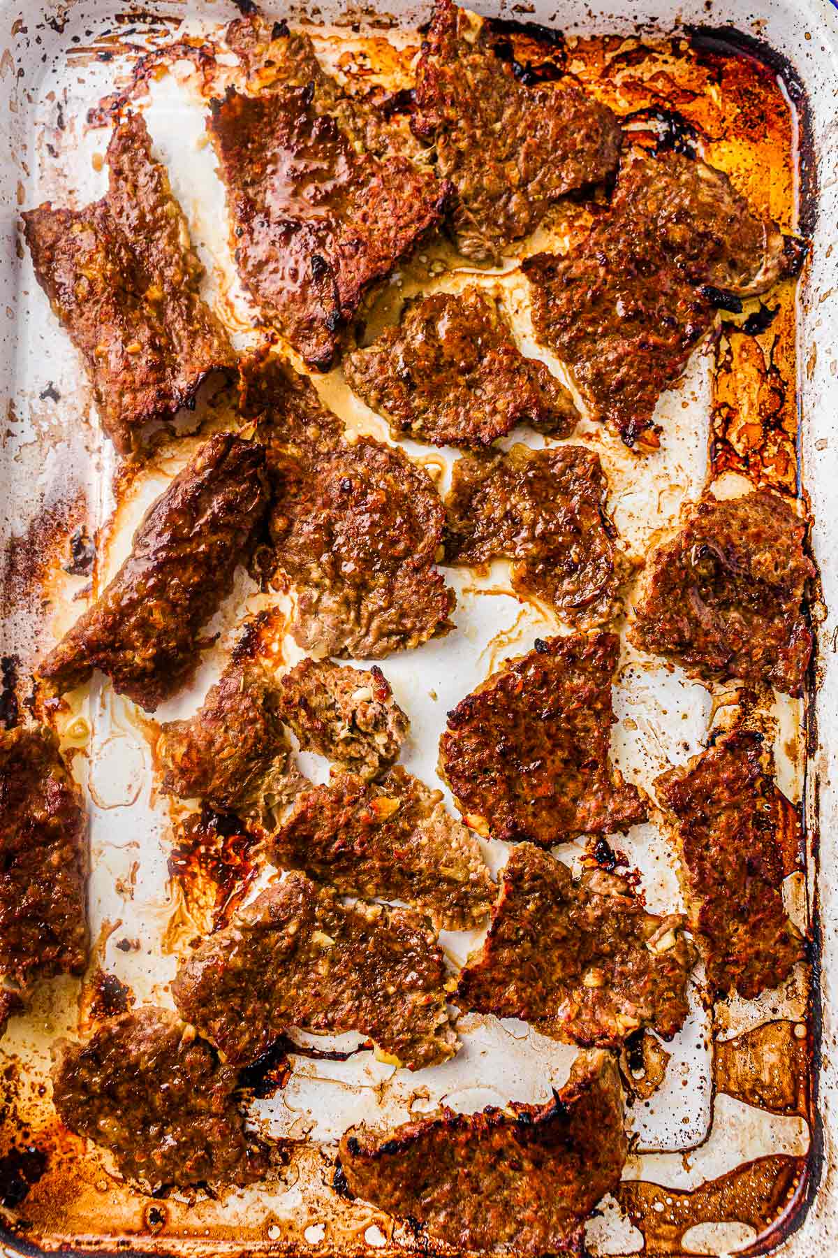 Crispy homemade doner kebab meat after broiling on a baking tray