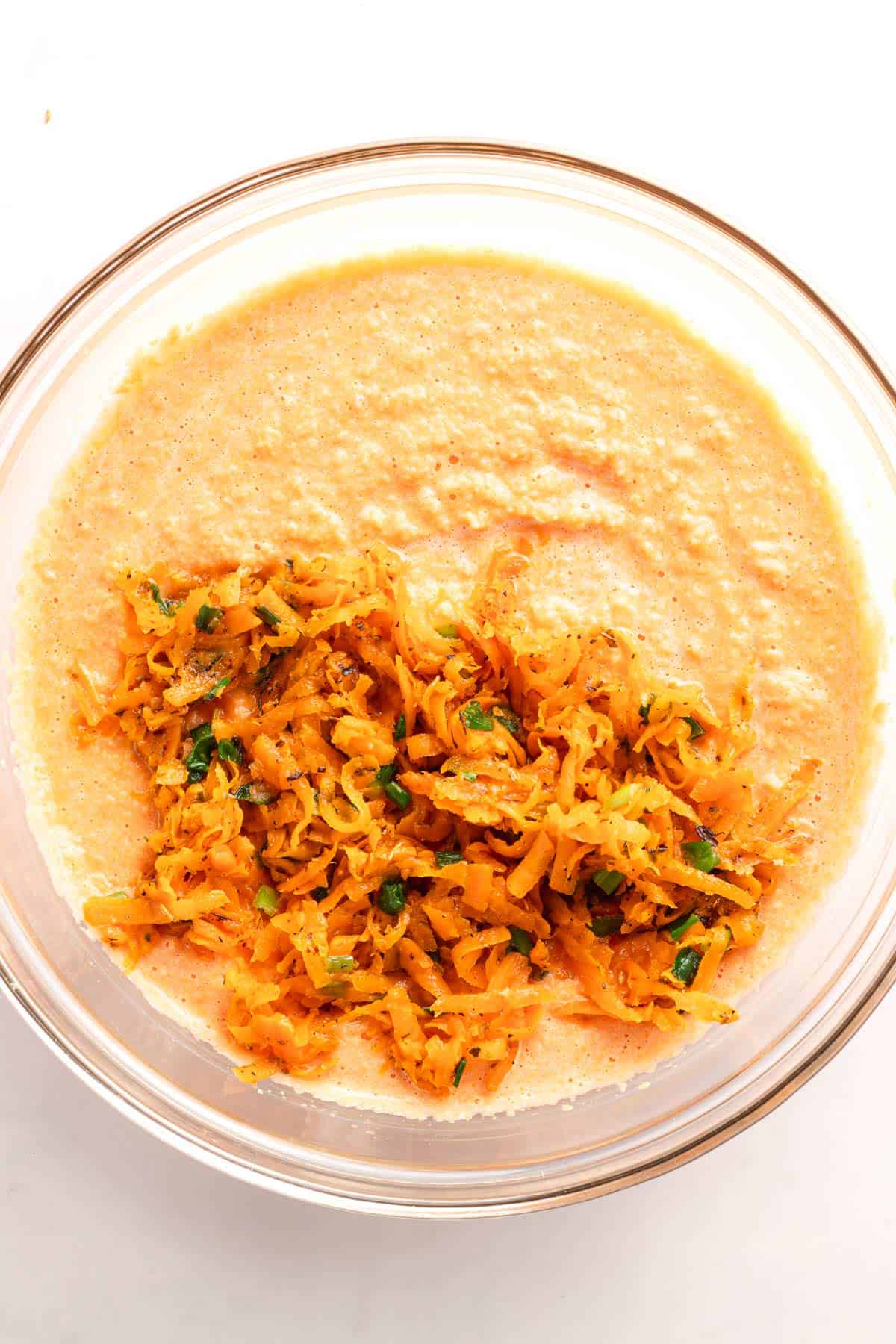 Cooked sweet potato mixture added to blended lentil batter