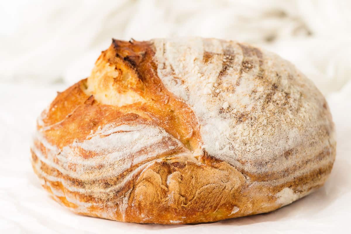 Crusty homemade sourdough bread with a golden artisan crust