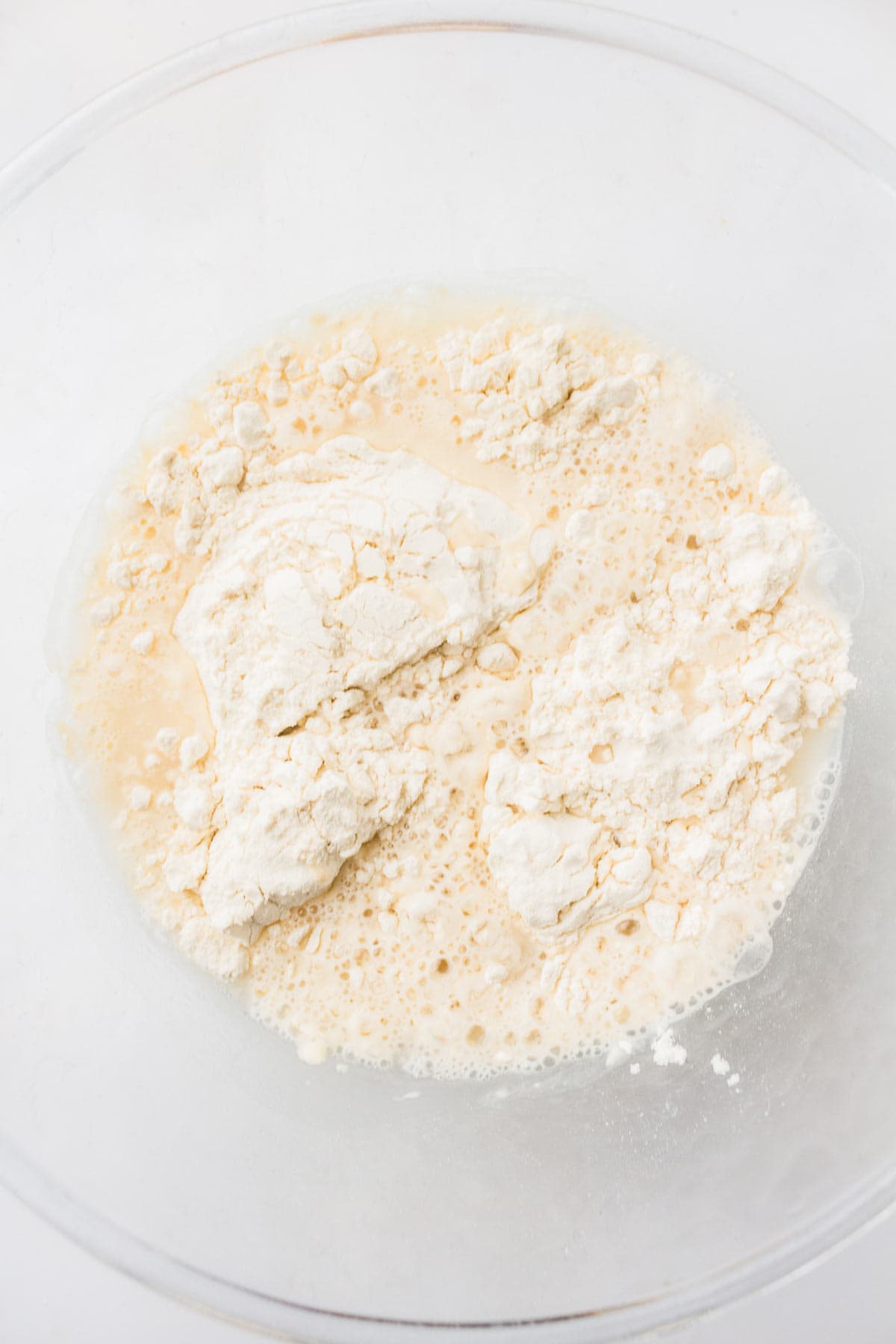 Bread flour measured in a mixing bowl for sourdough bread